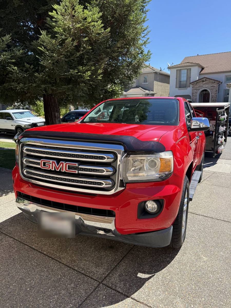 Red GMC Canyon. 3-Star Exterior Package