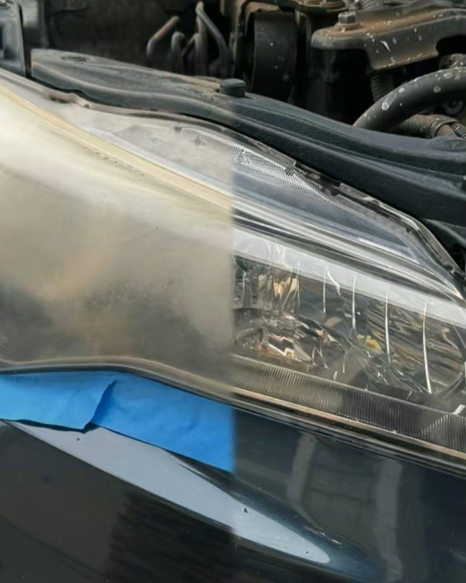 Headlight restoration. Hazy, yellowed lens cleared, shown halfway through